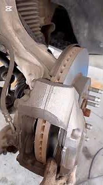 Escalade front Wheel brake pads replacement and rotor disc resurfacing