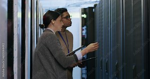 Team, discussion and server room, woman and man in network administration for database update. Tech employees, system maintenance and technician team problem solving online in data center together.