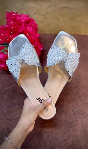 11K views · 50 reactions | Obsessed with these gorgeous silver sandals with the stunning diamante bow. They're the perfect touch of glam for any outfit—from a night out to a festive event. Get yours and step into the sparkle! ​#SilverSandals #DiamanteBow #GlamShoes #PartyWear #NewArrival | DifferentLook | Facebook