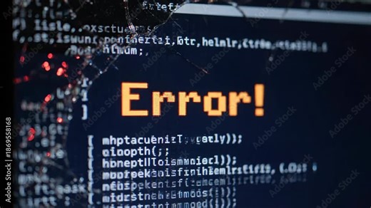 Computer monitor showing an orange error message and abstract code with a cracked glass effect.