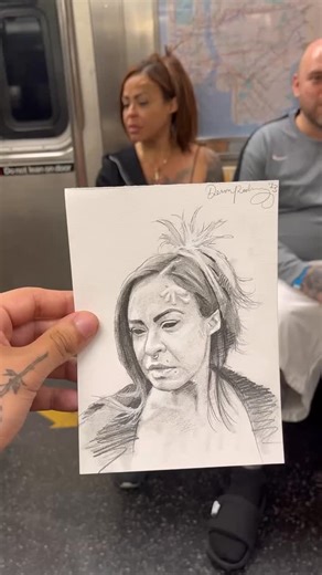 Artistpix on Instagram: "Devon Rodriguez is a Bronx-based artist who turns everyday subway moments into stunning, hyper-realistic portraits. 🎨✍️ He sketches strangers on the NYC subway, capturing quiet, powerful glimpses of humanity—and their reactions say it all. 🖼️❤️ Which one’s your favorite? 1, 2, or 3? Art by the incredible @devonrodriguezart Tag someone who’d love this! 👇"