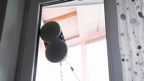 clip-4007246507-automatic-robot-window-cleaner-device-rotating-pads