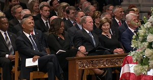 Michelle Obama Reveals What Really Happened During Her Sweet Exchange With George W. Bush