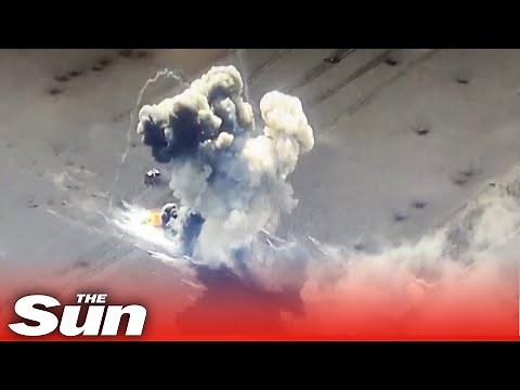 Ukrainian forces destroy Russian weapons in huge explosion