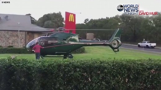 582K views · 4.5K shares | FLY-THRU: Locals at Sydney, Australia were shocked as a helicopter landed at a park in Rouse Hill Saturday afternoon, the pilot casually exiting the aircraft to go to a nearby McDonald's to pick up an order before getting back on his chopper and flying from the scene. www.abcnews.go.com | ABC World News Tonight with David Muir | Facebook