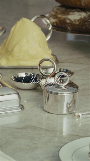 Trays, tableware sets, and refined accessories compose a universe designed for sharing—where light lingers, details glow, and functional gestures become aesthetic ones. Discover at www.christofle.com. #christofle #VertigoCollection #silverware #design #teatime #fyp