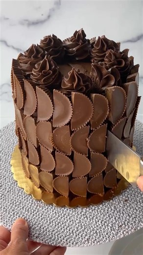8.5K views · 62 reactions | Yay or nay to a grocery store cake makeover? I needed a cake in a hurry for my husband’s birthday since we had been out of town for a week and I didn’t have a lot of time.Can you guess how many Reese’s I used? Comment CAKE for the recipe! https://www.momlovesbaking.com/walmart-glow-up-cake-with-peanut-butter-cups/#Cakemakeover #Walmart cake #ReesesCake #GroceryStoreCakeMakeover #CakeOver #peanutbuttercupcake | Mom Loves Baking | Facebook