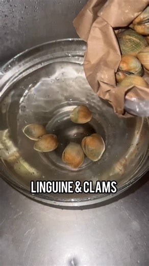 Iconic Linguine & Clams is Christmas Eve essential, but also super easy to make 🍋 🎄 Serves 4–6 | Prep Time: 10 minutes | Cook Time: 20 minutes Ingredients: 3 lbs vongole, littleneck, or manila clams (cleaned; keep some shells for serving) 1/4 cup extra-virgin olive oil, plus more for serving 2 tbsp unsalted butter, plus more for serving 1 lb linguine 4–8 cloves minced garlic 1–2 dried chiles 1/2 cup dry white wine (that you would drink) Juice of 1 lemon, plus wedges for serving 1–2 handfuls ch