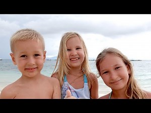 Children playing on the beach 4K