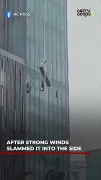 Terrifying Moment Window Cleaners' Cradle Slams Into Skyscraper