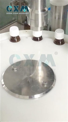 Syrup Bottle Capping Machine Manufacturer | 100ml Sealing Line by CXM Shanghai