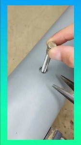 Installing a bolt in the center by using a magnet to hold and guide it into position easily