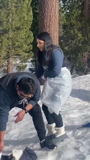Using trash bag as snow sled 🛷