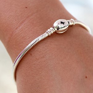 7.7K views · 154 reactions | Our new Oval Snap Bracelet has arrived! The beautiful new oval-shaped closure features an engraved Chamilia logo with our iconic hummingbird. | Chamilia, A Swarovski Company | Facebook