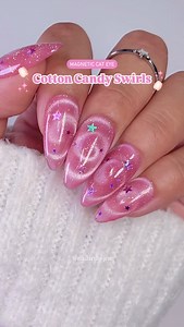 Jeanette Flores on Instagram: "Cotton candy magnetic cat eye swirls! ✨🧲🩷🍭🌀💅🏽😍✨ Save and share this easy cat eye look for inspo. Follow for more nail tutorials 🫶🏼 Using all products from @daily_charme (code: JEN10) •E01 Rosélicious •Strong Magnet Cylinder •Magic Wand Cat Eye Magnet Pen •Colorful Holographic Stars Glitter Set / 12 Jars •Diamond Shine Top Coat #cateyenailart #cateyenails #nails #nailsart #nailinspiration #nailvideos #nailtrends #summernails #nailinspo #naildesign #diynails