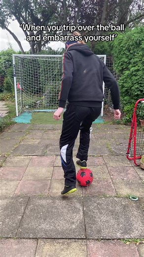 Boy Tripping Over Soccer Ball