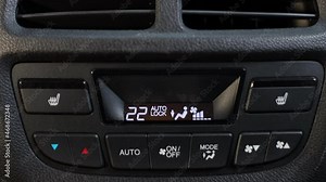 Close-up. Climate control system control panel for rear passengers