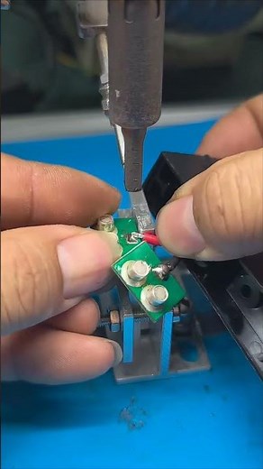 Soldering wires on a PCB — simple and efficient. #PCBSoldering #SwitchWiring #CircuitBoardWiring