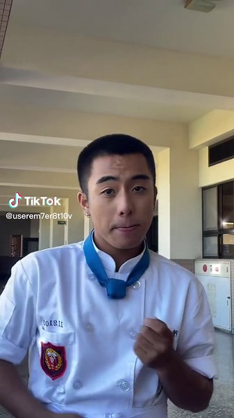 Chef Demonstrates Culinary Techniques in Professional Setting