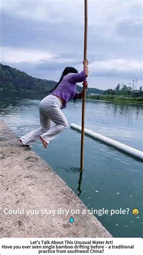 Single Bamboo Drifting – Woman Glides Across Calm Water with a Pole 🎋💧