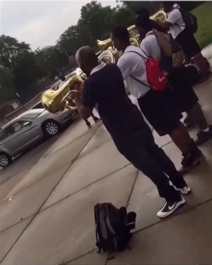 Energetic Marching Band Performance with Baritone Instruments