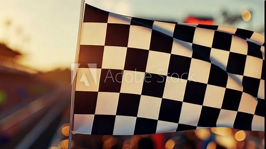 Exciting race finish with waving checkered flag, blurred track, cheering crowd, and golden hour light