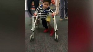 Three-year-old takes first steps on new prosthetic leg after last prosthetic was stolen
