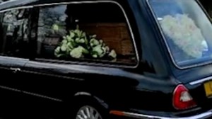 Moment guitarist Jeff Beck's hearse is seen during his funeral