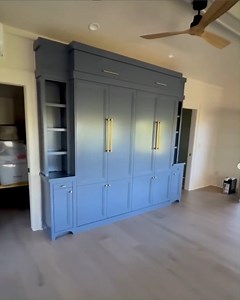 Absolutely gorgeous, right?!  This King-size Murphy bed with...