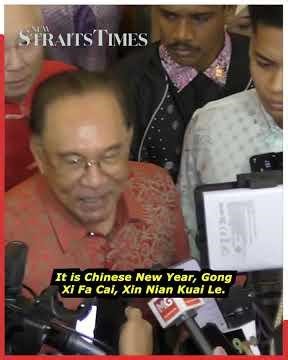 No shop talk: Anwar skips Rafizi, political questions at MCA CNY open house