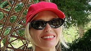 January Jones looks youthful as she sizzles in a red and white bikini