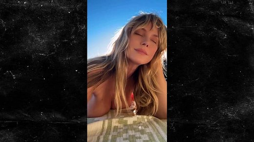 Heidi Klum Leaves Little To The Imagination While Tanning