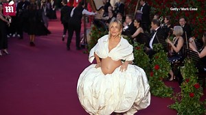 Pregnant Sienna Miller teases her tummy at Vogue World: London