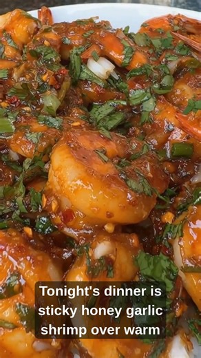 Sweet, spicy shrimp with a shiny sauce. Pile it over warm rice and add cilantro on top. Dinner feels fancy, but it’s fast. #shrimpdinner #quickskilletmeal #ricerecipe | Kristina Recipes
