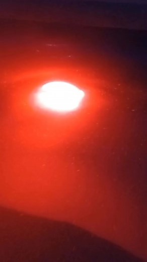 Captivating Night Pool Swim and Fiery Display