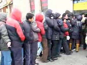 Chinese 'queue' Beijing Train Station