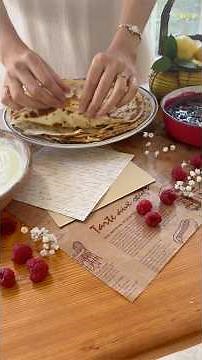 French crepes with ricotta cheese and berry sauce