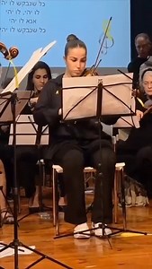 Agam Berger, a survivor of Hamas captivity, was released on January 30, 2025, after enduring 482 unimaginable days as a hostage in Gaza. She is not only a symbol of resilience and hope but also an exceptionally talented violinist. Now, she returns to the stage as she performs in a concert advocating for the release of the 59 hostages still held in Gaza. 🎗️ | StandWithUs