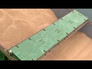 Grain Exports from Russia. Agroholding IEC. Loading wheat onto a cargo ship at the seaport.