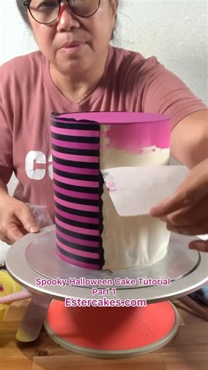 Ester Holt on Instagram: "Spooky 👻 Halloween cake Tutorial Part 1 I m using Pinstripe and Smooth hound cake comb from Estercakes.com Stay tuned and Follow me for part 2 Buttercream : Swiss Meringue Buttercream I m using regular parchment paper for this technique"