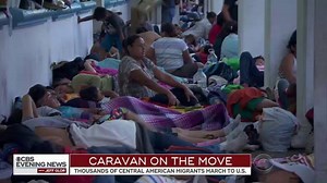 21K views · 226 reactions | Entangled, emotional and exhausted, members of the 7,200 person caravan making its way to the U.S. created a tarp city on their second stop into Mexico. https://cbsn.ws/2NYYhYM | CBS Evening News | Facebook