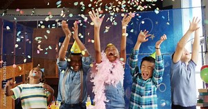 Mixed-race and African American kids having fun during birthday party