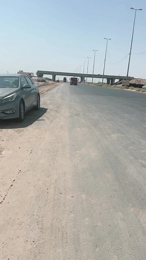 Vehicles in Motion: A Scenic Drive on a Clear Day