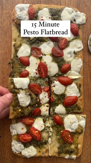 This pesto flatbread recipe is ready in just 15 minutes! It’s perfect for an easy weeknight meal or a quick appetizer to enjoy with friends. Ingredients: 1 flatbread (roughly 5 x 10 inches) 1/4 cup prepared pesto 4 oz fresh mozzarella cheese 1/2 cup cherry tomatoes, halved Instructions: Preheat oven to 450 degrees. Spread the pesto on the flatbread and top with mozzarella cheese and cherry tomatoes. Place the pizza on a baking sheet and bake for 12-15 minutes or until the crust is golden brown. 