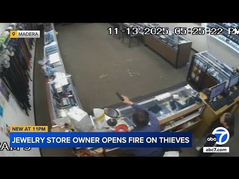 Jewelry store owner opens fire on group of masked robbers