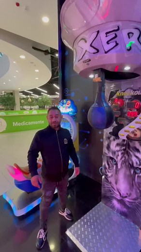 Punching Bag Game Experience in Indoor Arcade