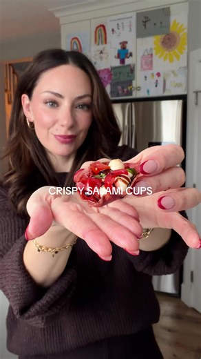 Need a last minute appetizer idea? Make my Crispy Salami Cups - recipe below & linked in bi0! ❤️ Equipment 1 standard size muffin tin 1 cooling rack Ingredients 12 pieces Genoa salami thinly sliced 1/2 cup cherry tomatoes chopped 1/2 cup mini pearl bocconcini 3 tbsp fresh basil chopped 1 tbsp olive oil Instructions Preheat your oven to 400∘F. Shape the salami: place one piece of salami into each cup of a regular muffin tin. Gently press down to form a cup shape. Sammy's tip: a shot glass or very
