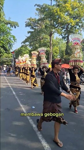 Preparation of the dancers and participants in the opening parade of the Balinese arts festival a...