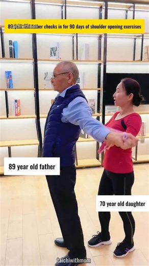 TaiChi With Mom on Instagram: "A 70-year-old daughter joins her 89-year-old father every day for simple shoulder-opening exercises. His posture and spirit are improving day by day — it’s a gentle and effective routine the whole family can do together! 💪💖 Curious about the band we use? Just comment “BAND” and I’ll send you the link! 😊 #ShoulderOpening #HomeWorkout #ShoulderAndNeckCare"