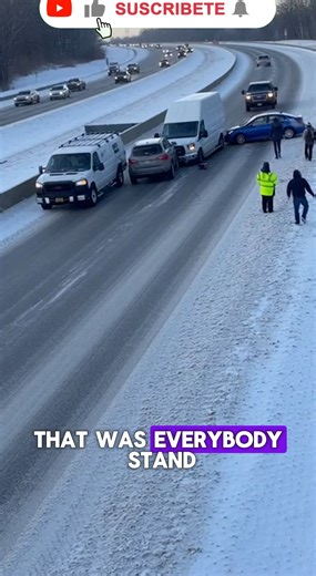 IA Matrix on Instagram: "A high-angle, fixed traffic camera captures a chaotic multi-vehicle pile-up on a snow-and-ice-covered highway during a winter morning. The timestamp reads 02-02-2025 08:16:43, marking the exact moment conditions spiral out of control. Several vehicles—including a silver hatchback, a pale green wagon, and multiple black and white SUVs and sedans—are already mangled together near the shoulder and off-ramp entrance. A few bystanders stand nearby when a blue sedan enters at 